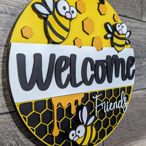 Buzzing with Warmth: Welcome Friends Cartoon Bee Door Hanger | Laser Cut Wood Sign - Image 2