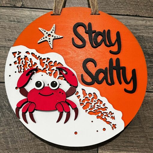 Stay Salty: Coastal Charm Meets Artistry in a 10-Inch Wave Sign with Crab, Starfish, and Laser-Cut Wood Craftsmanship - Perfect Home Decor for Beach Lovers